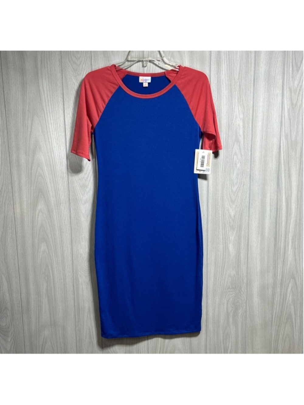 NWT LuLaRoe Julia bodycon dress featuring a vibrant blue color and red dress